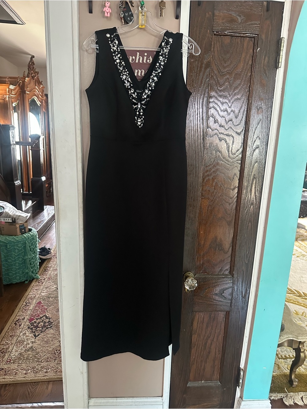 Elegant Black Maxi Dress with Embellished V-Neck